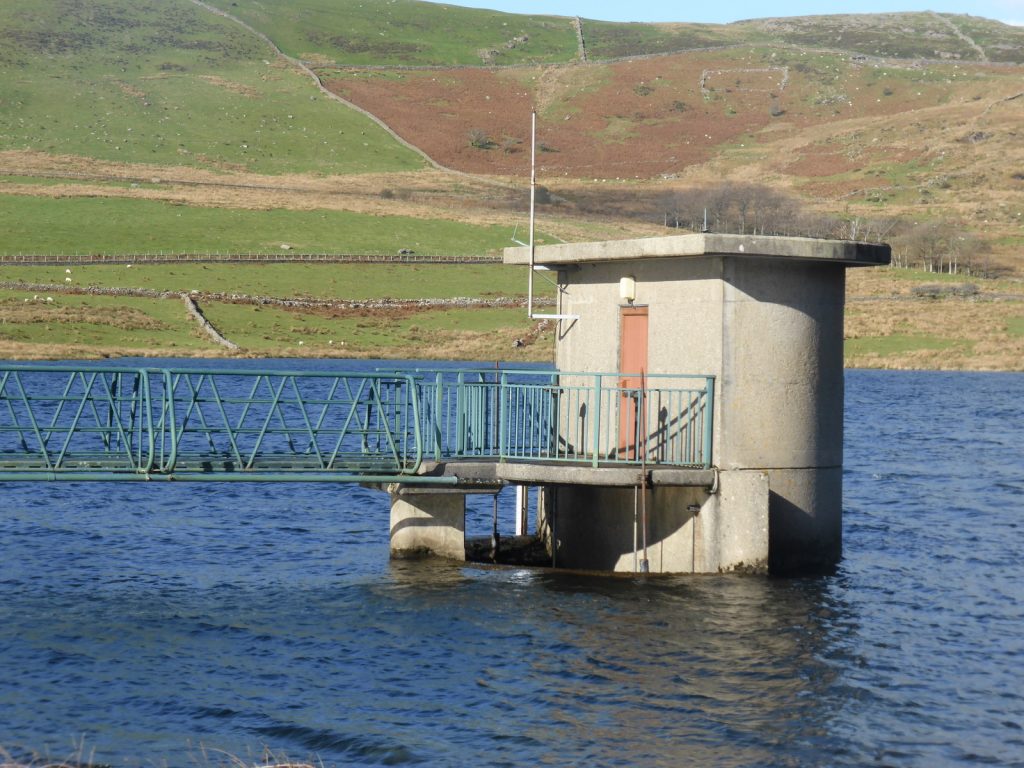 round concrete reservoir valve house