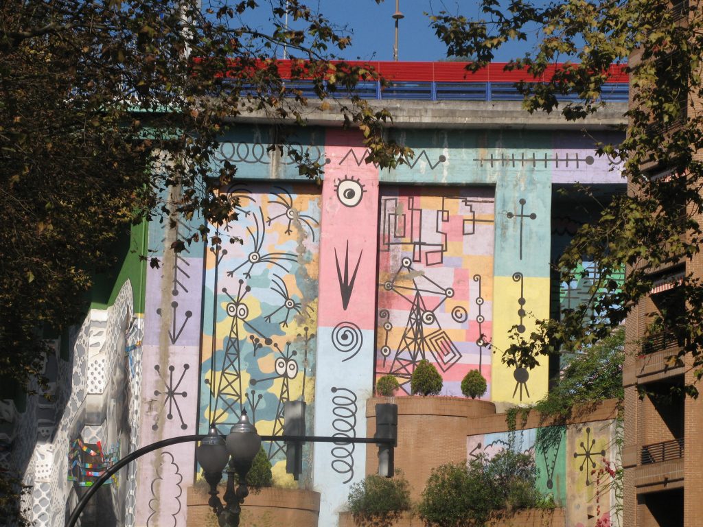 wallart on concrete road support wall