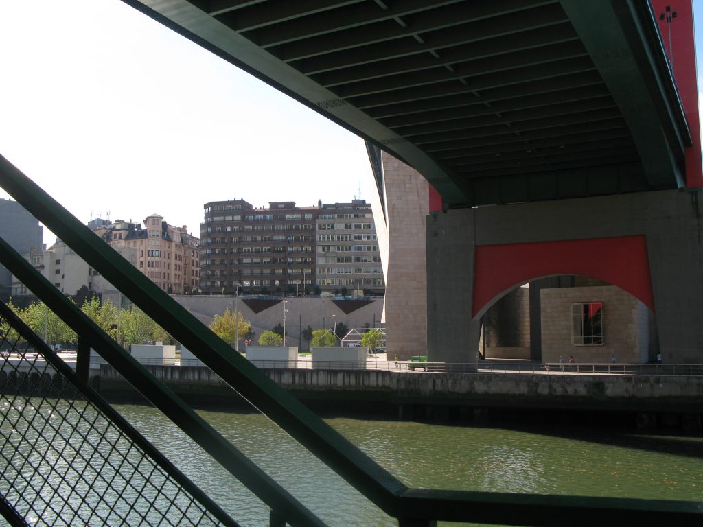 under-roadbridge shadows on river