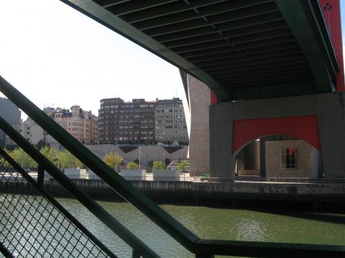 under-roadbridge shadows on river