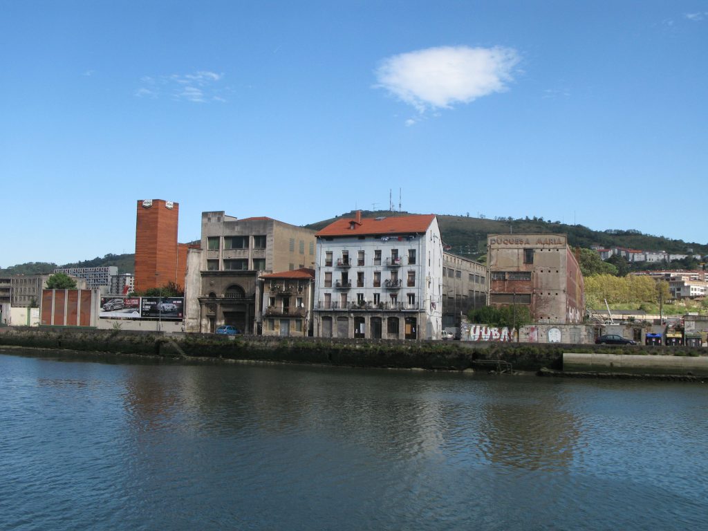riverside view with round fluffy cloud