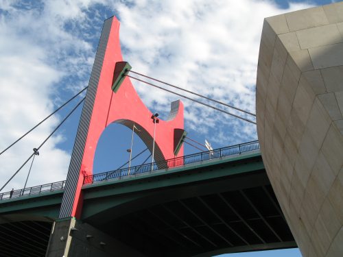 red painted bridge support