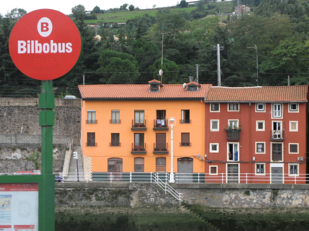 colourful bus stop and buildings
