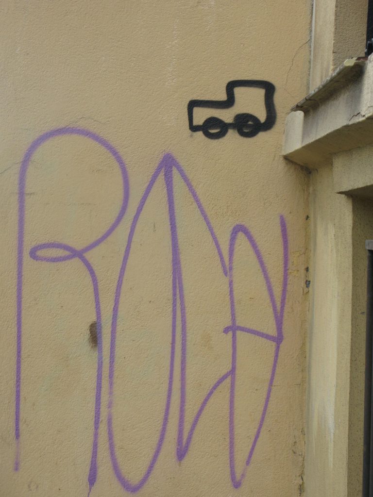 scribbled wall with van motif