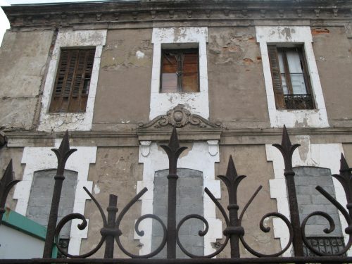 crumbly building with agressive railings