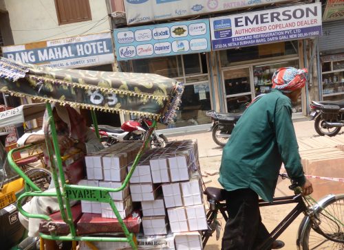 cycle rickshaw delivering boxes