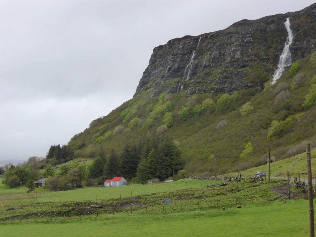 (almost) sunny cliff with red-roofed bothy and soft foliage