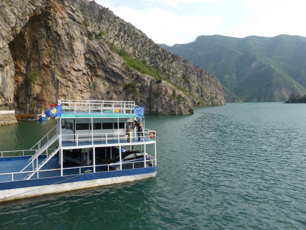 ferry on blue lake