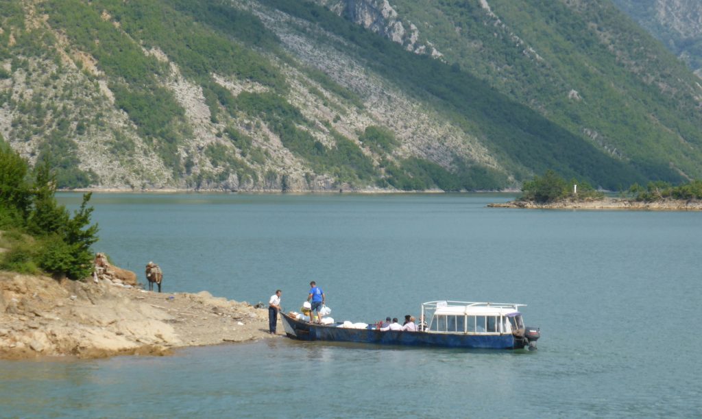 small boat disembarking peeple