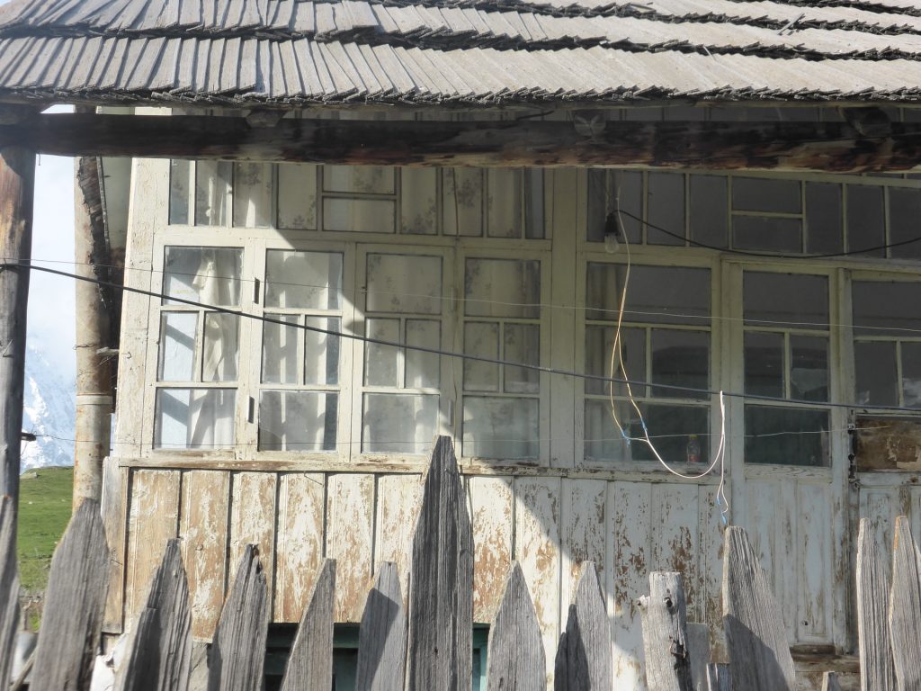 bleached white wooden house frontage