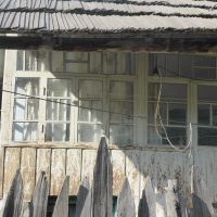 bleached white wooden house frontage