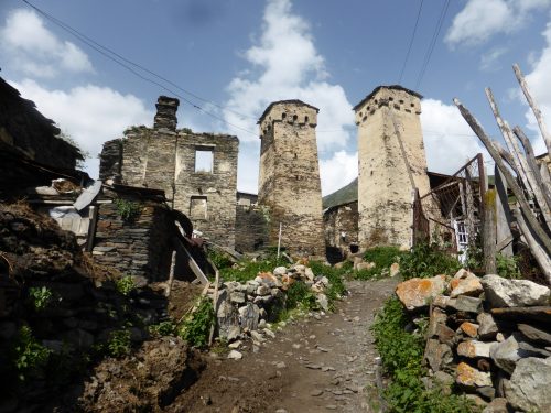 2 stone towers and ruined stone building