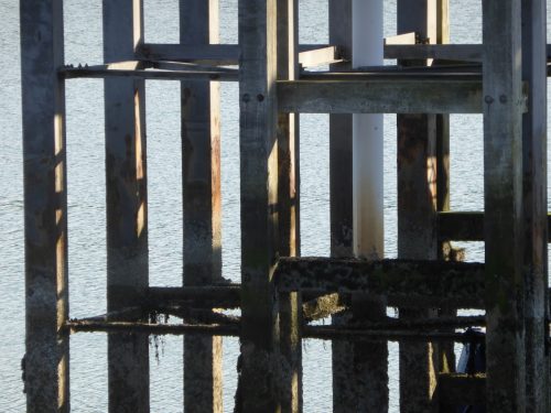 grid pattern of pier supports and shadows
