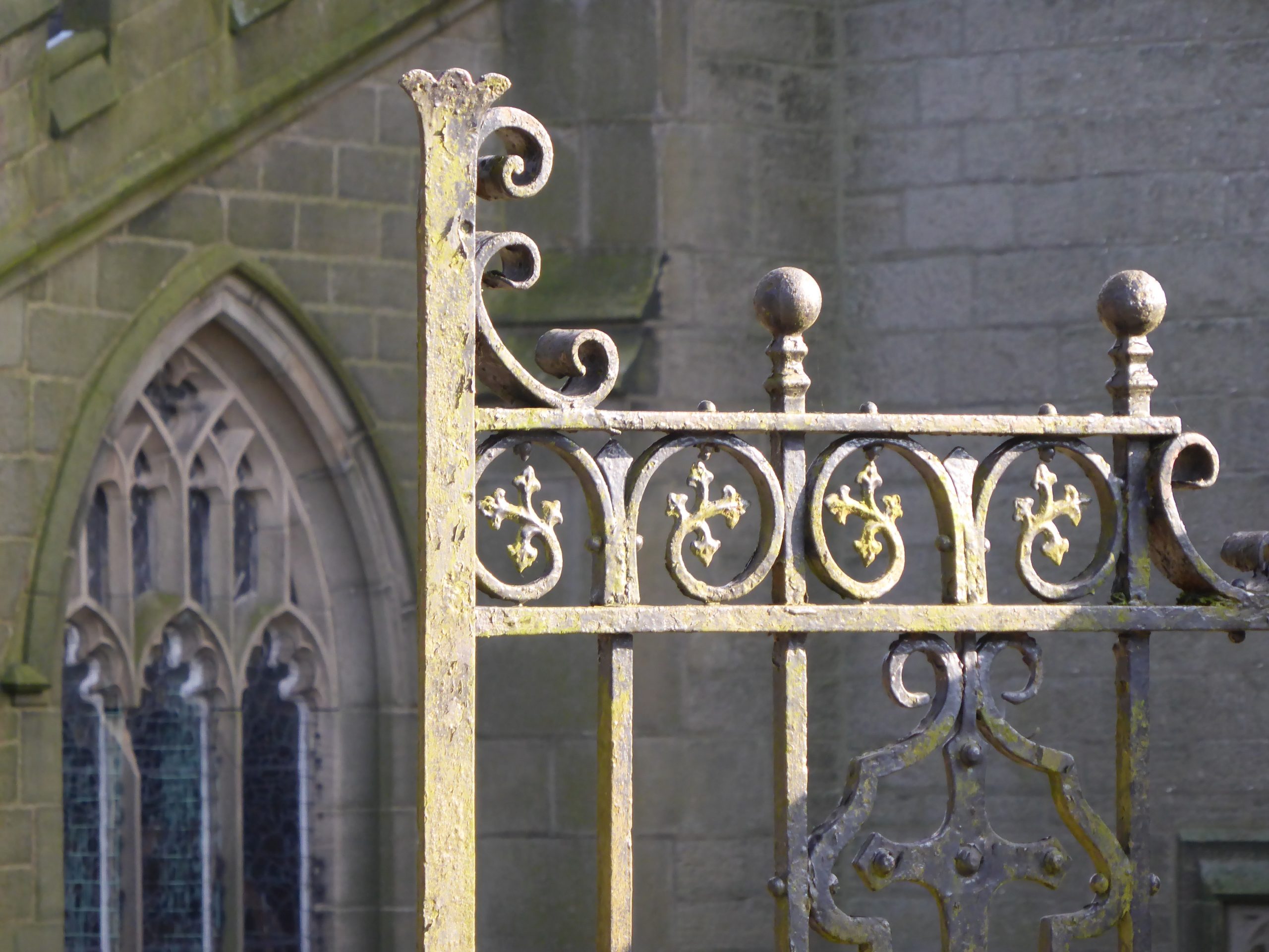 iron gate with scrolling pattern