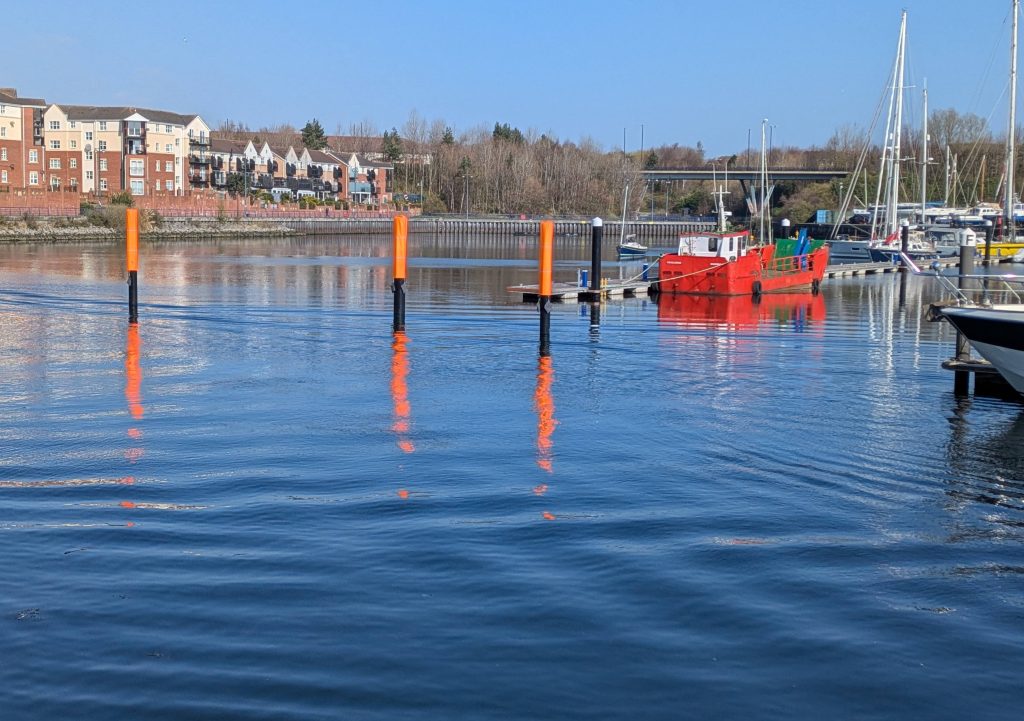 blue red orange reflections in the water