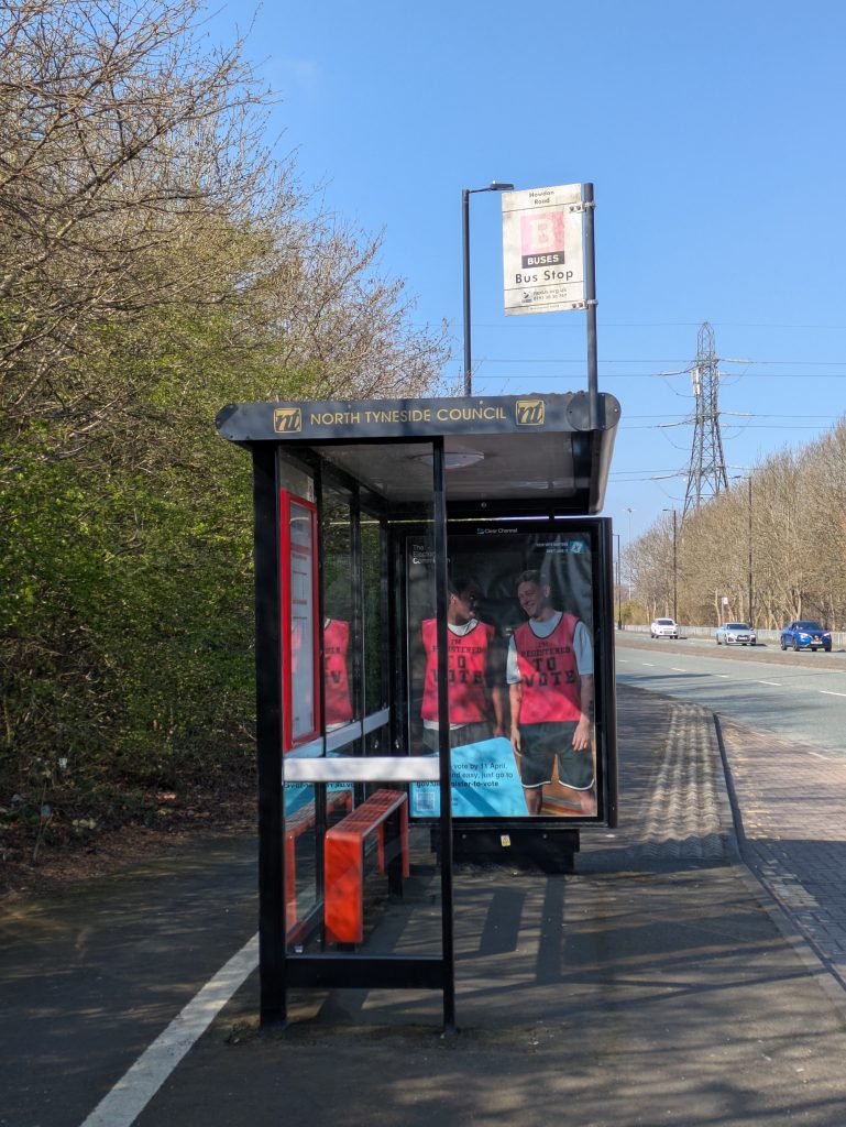 bus shelter advertising hoarding looks like real people waiting